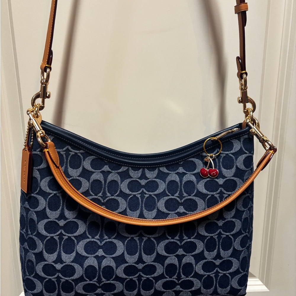 Coach Navy Signature Canvas Shoulder Bag with Tan Leather Trim and Cherry Charm